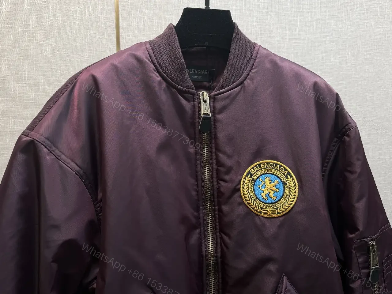View 2 of Burgundy Satin Bomber with Crest Patch — Luxe Everyday Outerwear
