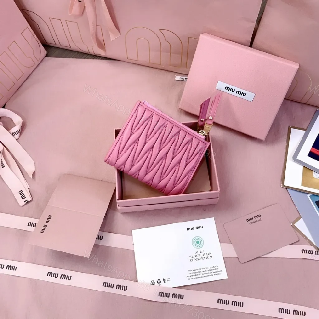 View 2 of Quilted Pink Wallet with Gold Logo – Luxe Bi-fold Wallet