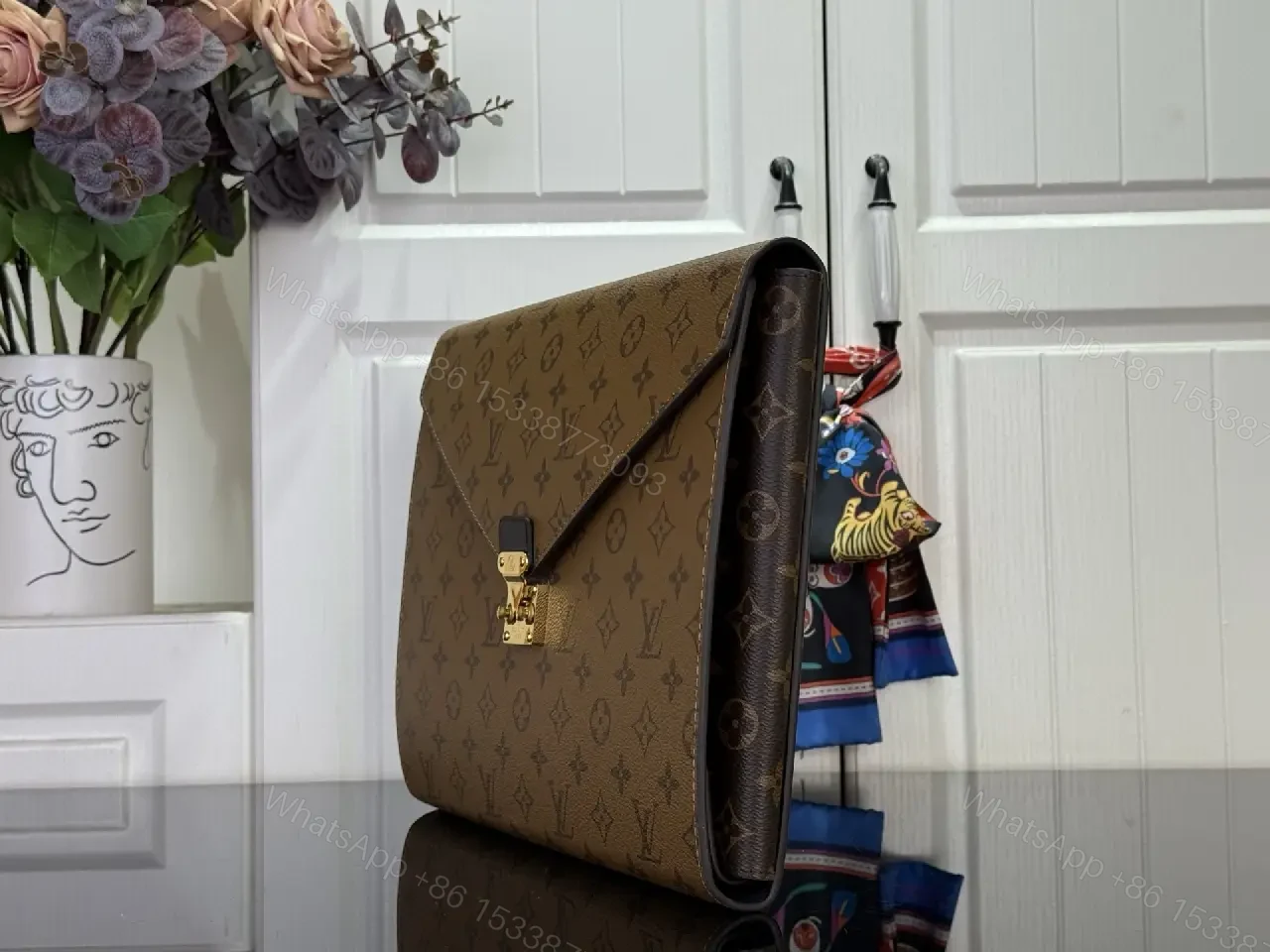View 4 of Classic Monogram Clutch: Coated Canvas, Gold Lock, Envelope