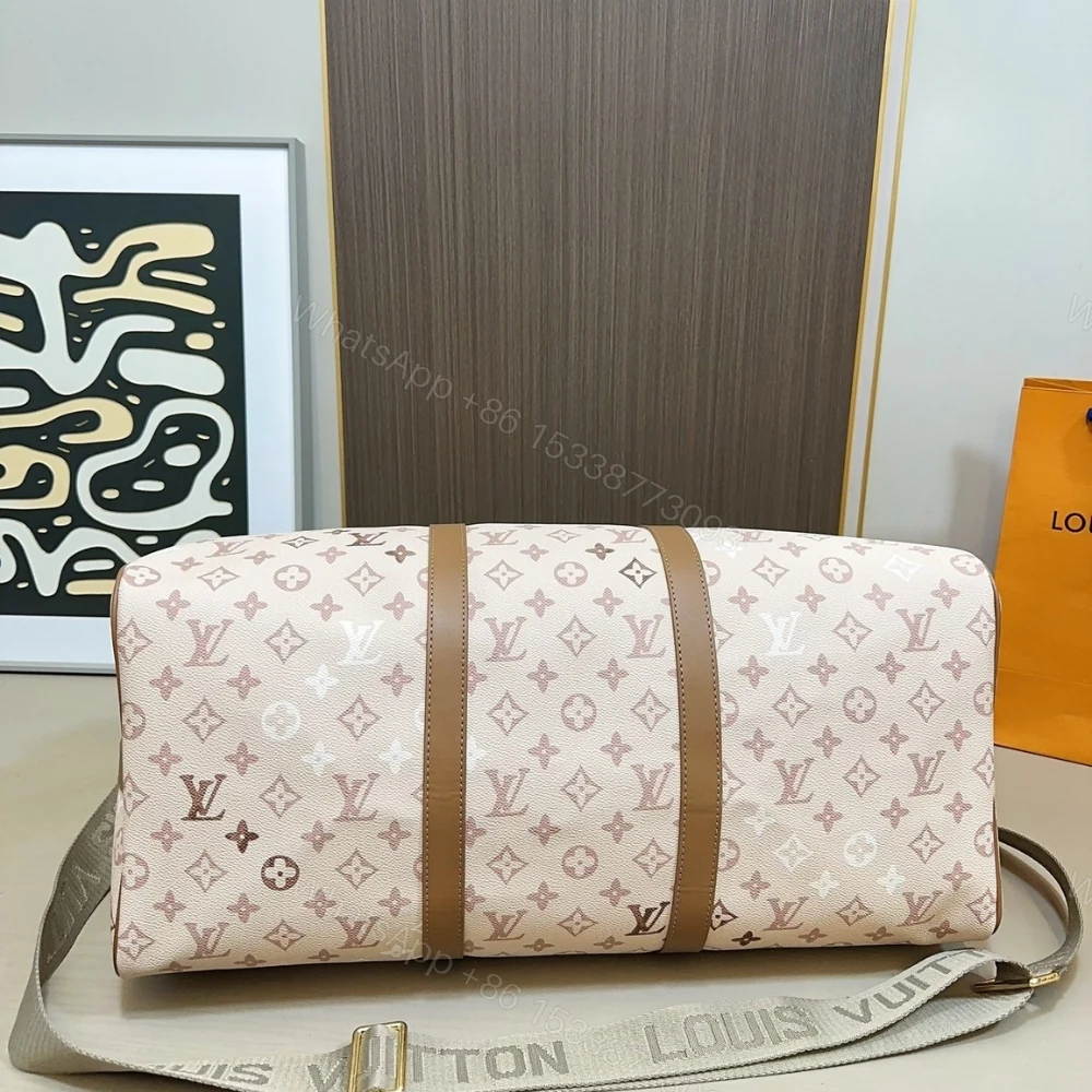 View 7 of Louis Vuitton Keepall Bandoulière 50 Monogram Beige 50Cm