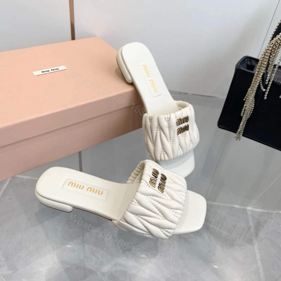 View 6 of MIUMIU MATELASSÉ NAPPA LEATHER SLIDES WHITE 5XX605 88T F0009 F 010