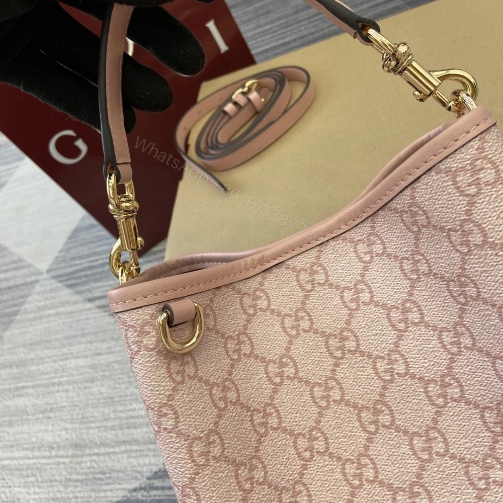 View 3 of GUCCI GG EMBLEM SMALL BUCKET BAG LIGHT PINK COATED FABRIC 21CM 815118 FAD6L 8459