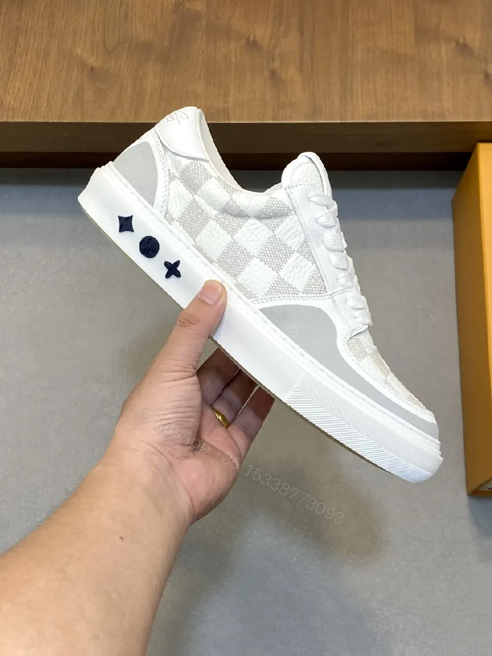 View 9 of White Checkerboard Leather High-Tops with Subtle LV-Style Accents