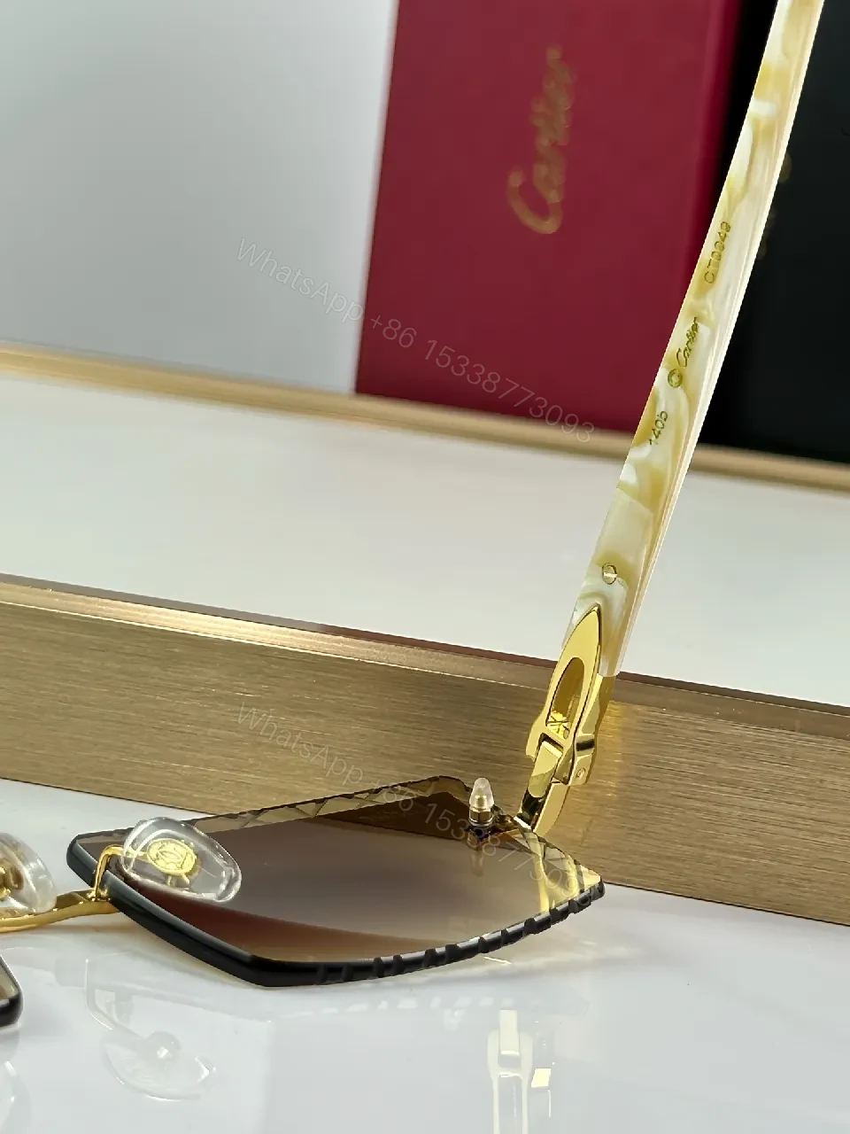 View 5 of Rimless Shield Sunglasses: Gold Accents, Luxury Minimalism