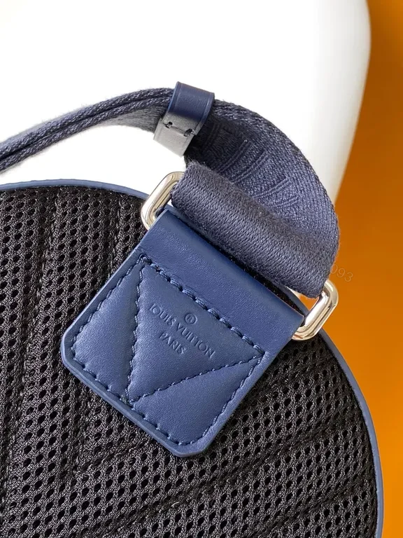 View 2 of Chic Blue Leather Compact Backpack with LV Detail