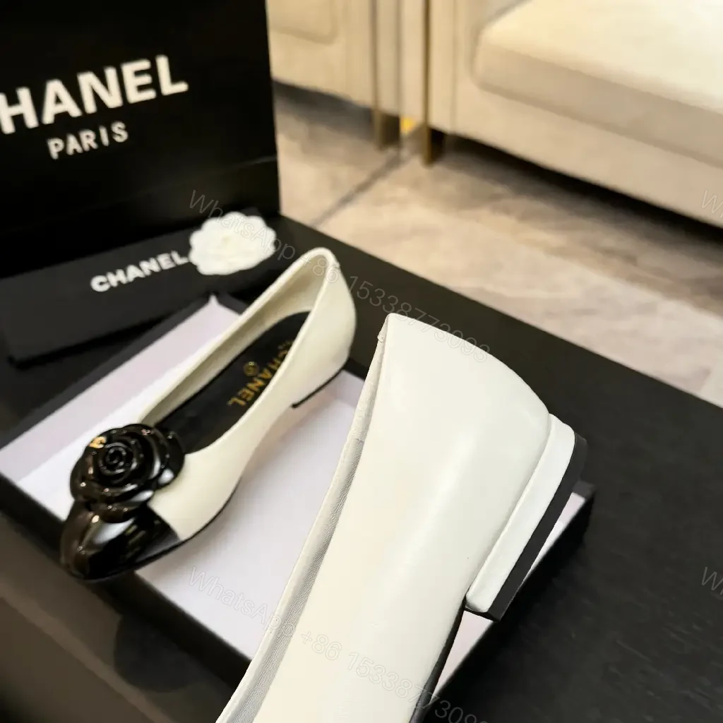 View 8 of Chic White & Black Ballet Flats with Rose Embellishment