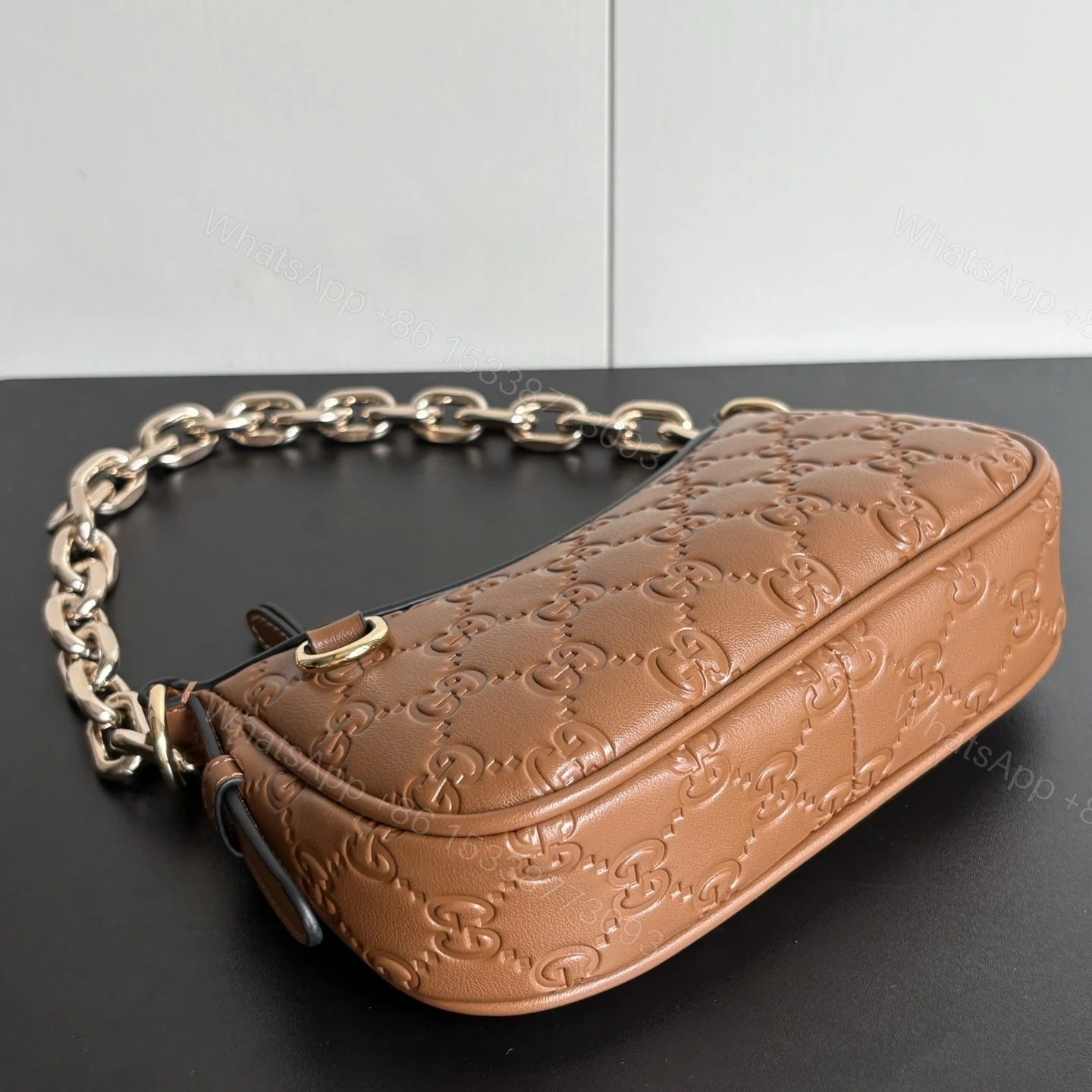 View 5 of Gucci Gg Emblem Mini Shoulder Bag In Brown Gg Embossed 19Cm