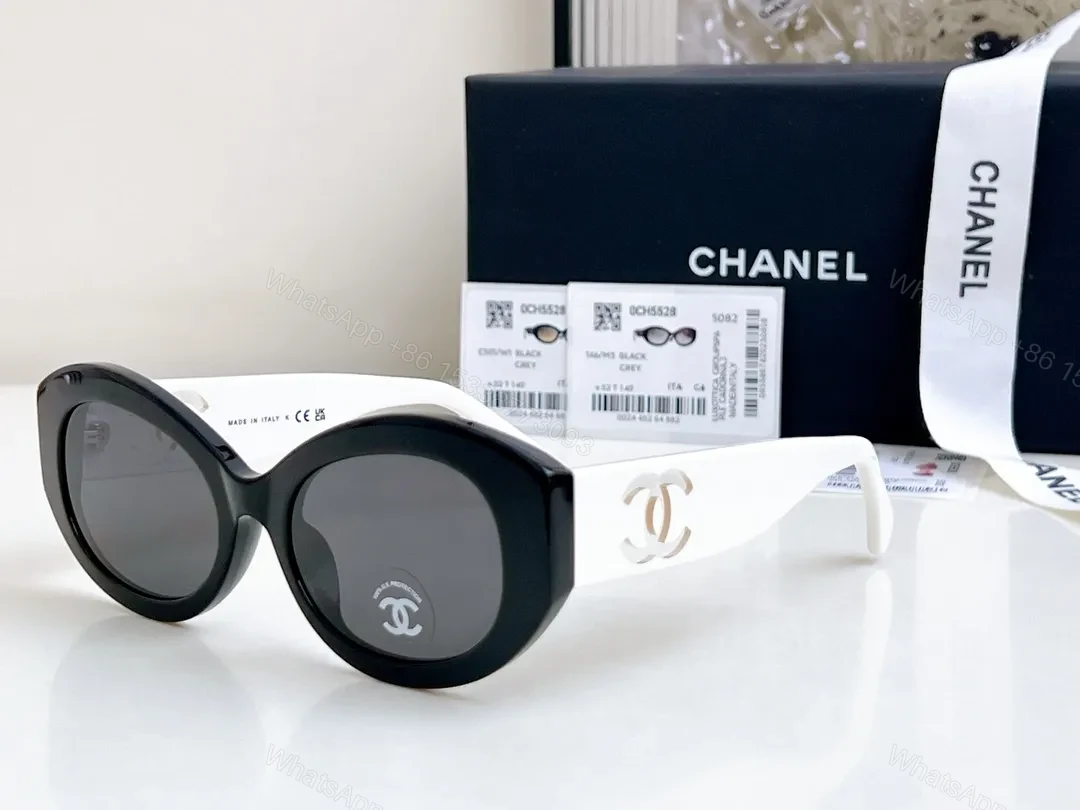 Bold Curve Sunglasses: Black/White Acetate, Oversized Cat-Eye — view 1