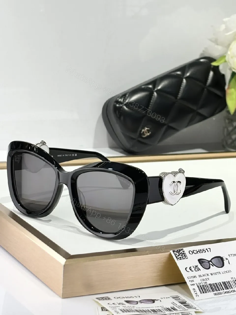 View 7 of Oversized Black Cat-Eye Sunglasses with Subtle Logo Details