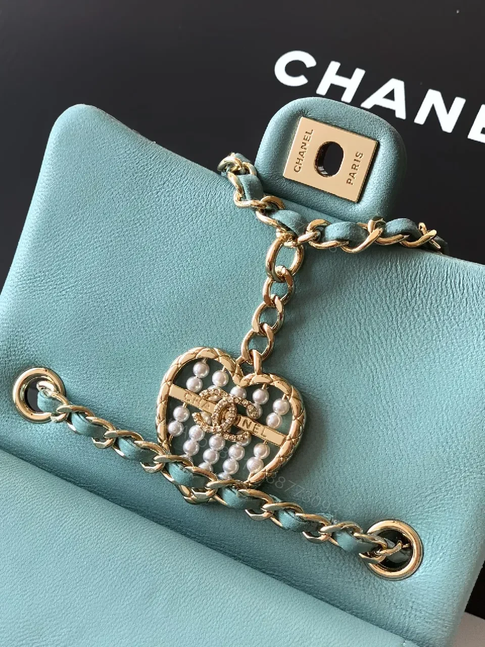 View 7 of Pastel Aqua Quilted Mini Bag with Pearl Charm (Chic)