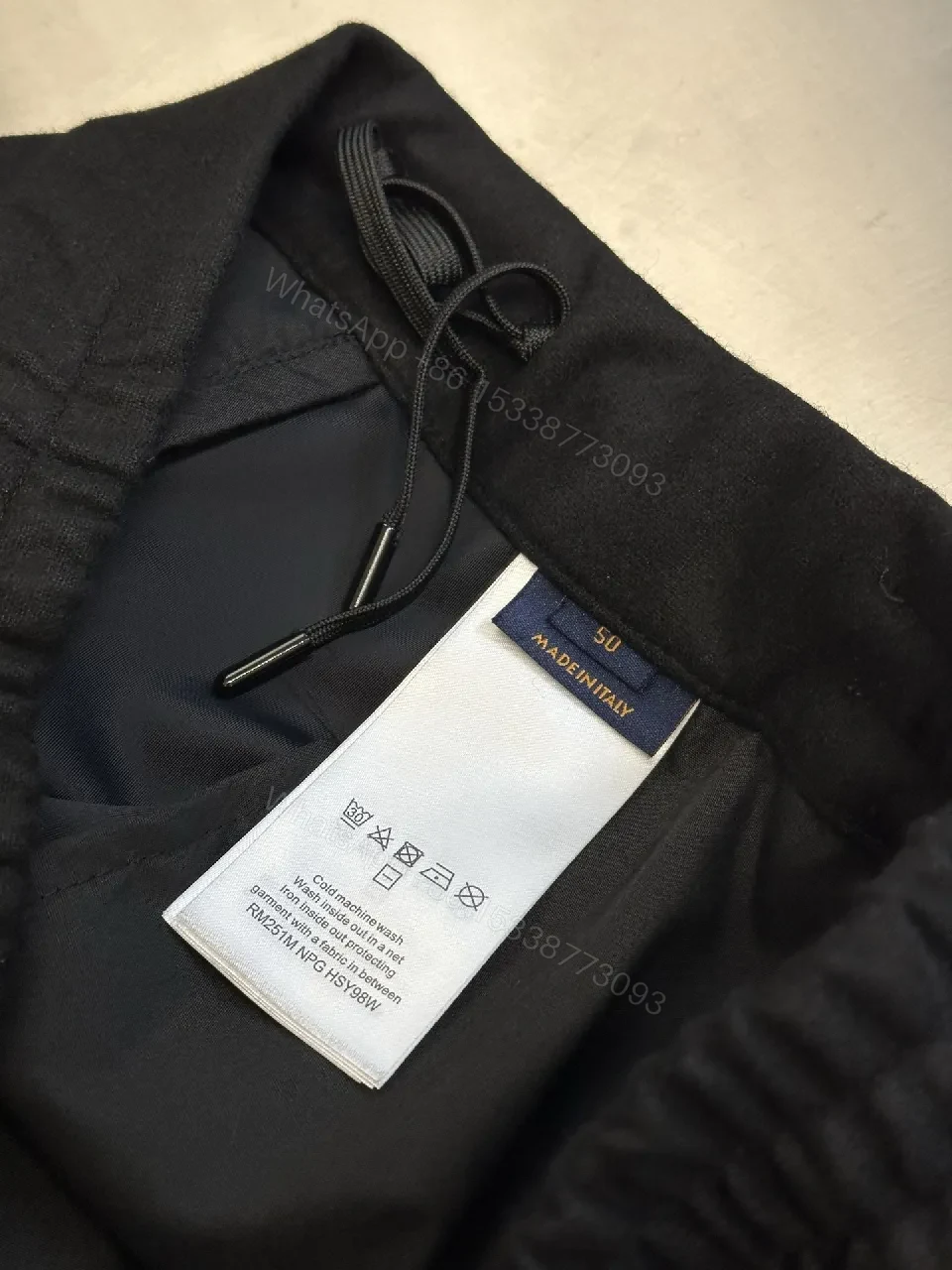 View 6 of Minimalist Tailored Trousers: Subtle LV Monogram Detail