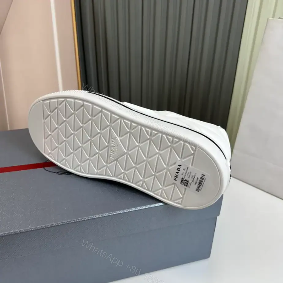 View 3 of PRADA MACRO RE-NYLON AND BRUSHED LEATHER SNEAKERS – PRD061