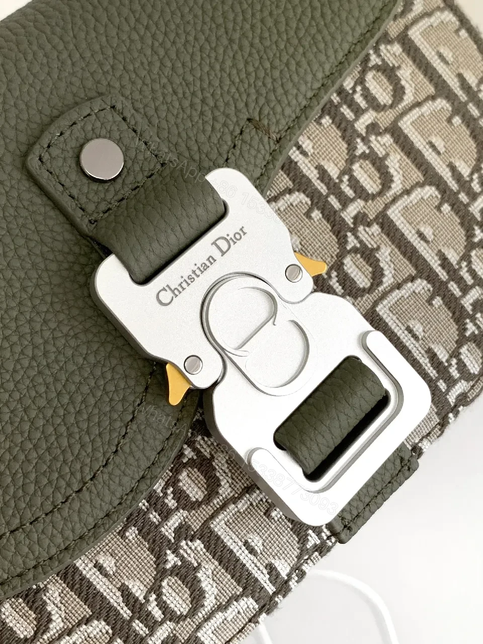 View 3 of Olive Pebbled Leather Crossbody with Monogram Accent