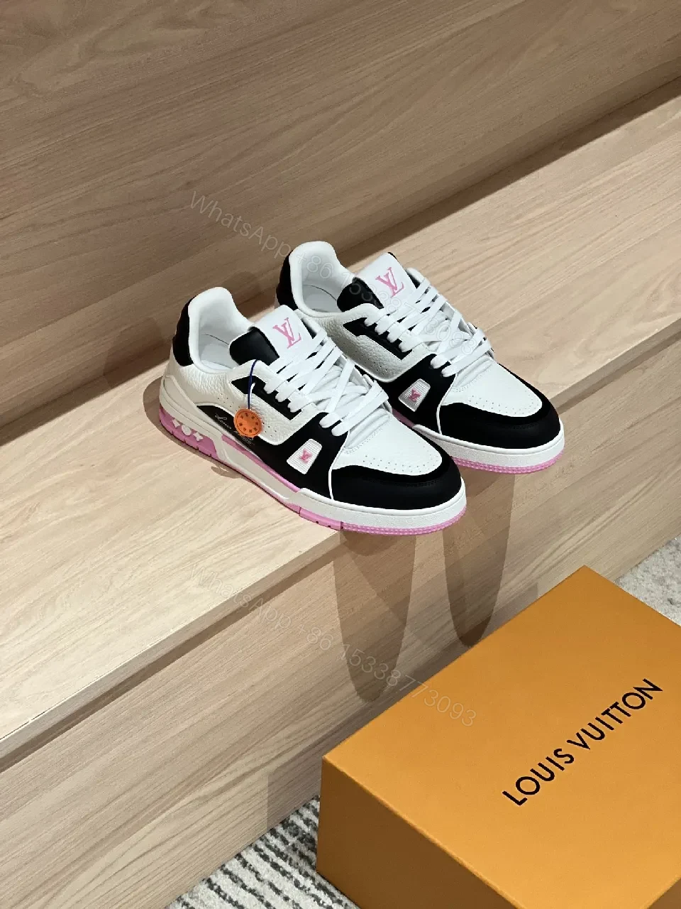 Two-Tone Luxe Sneaker: Leather, Pink Accents, Cushioned Sole — view 1