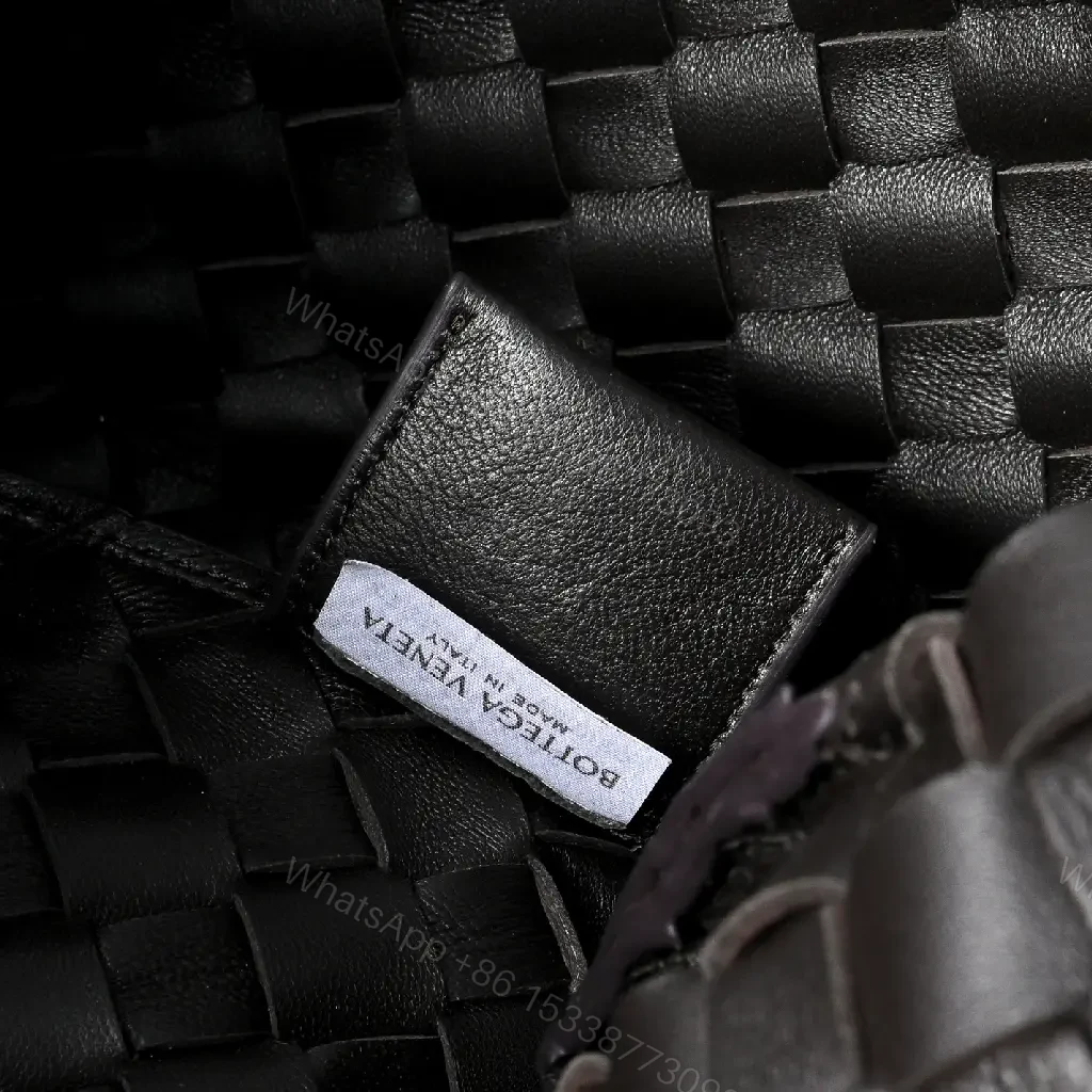 View 8 of brown woven leather hobo bag with intrecciato texture for everyday luxury