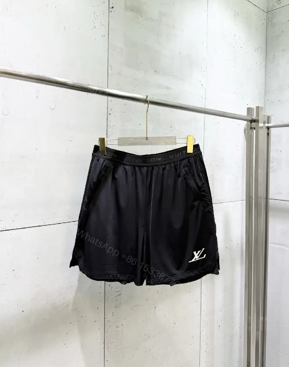 View 6 of Matte Black Quick-Dry Shorts with Subtle LV Detailing