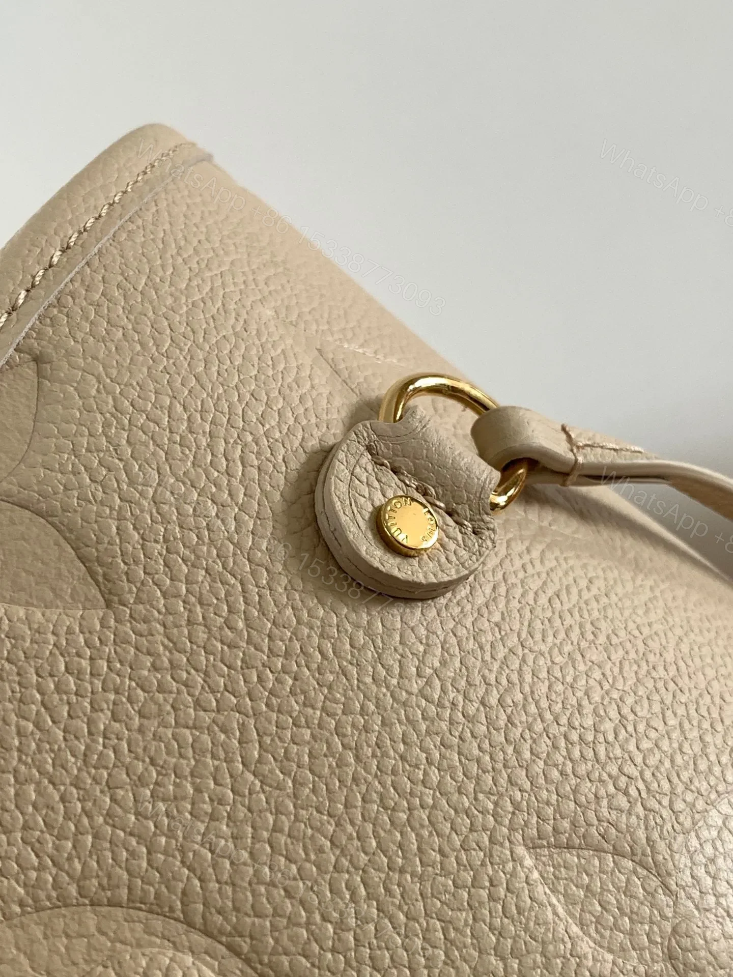 View 2 of LV NEVERFULL 32 LIGHT BEIGE MONOGRAM EMPREINTE LEATHER