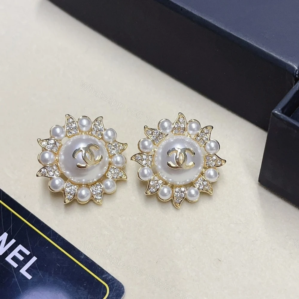 View 5 of CHANEL SUNBURST PEARL AND CRYSTAL EARRINGS IN GOLD TONE
