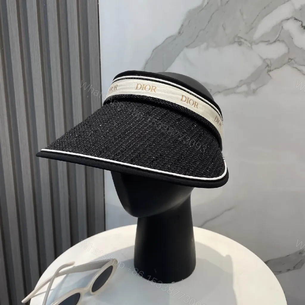 Chic Black Visor Hat with Dior Band: Elevated Everyday Style — view 1