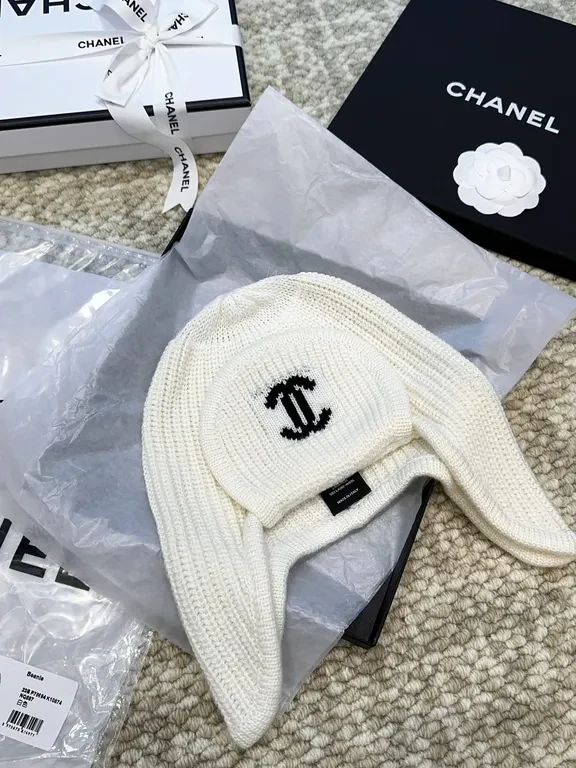View 8 of Ivory Merino Knit Ear Warmer Hat - Luxe Logo Emblem