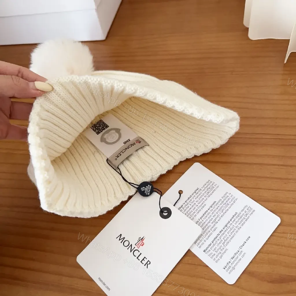 View 8 of Cozy White Knit Beanie with Pom Pom – Luxe Casual Style
