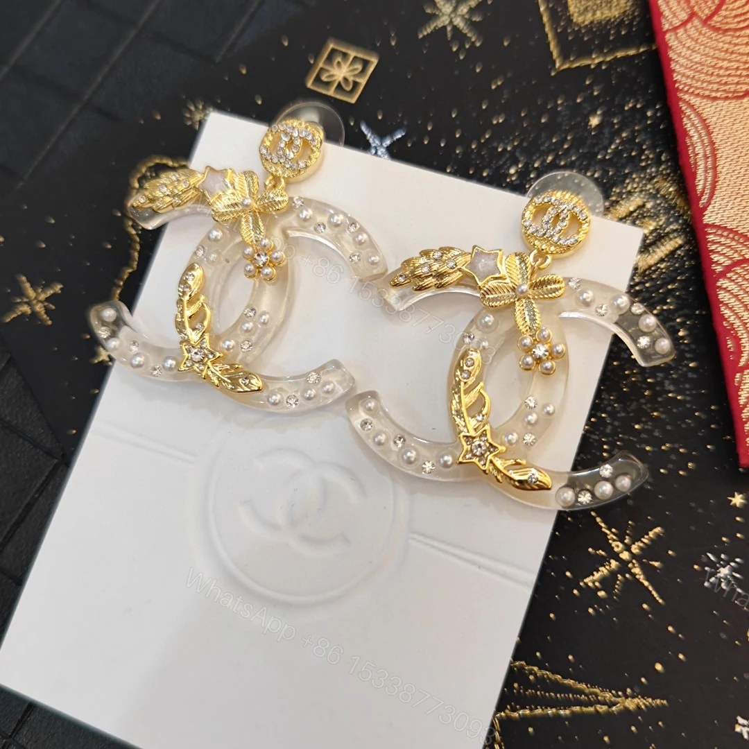 Chanel 一比一透明雙C星月蝴蝶結耳環 浪漫浮雕細節 女士夢幻飾品 — view 1