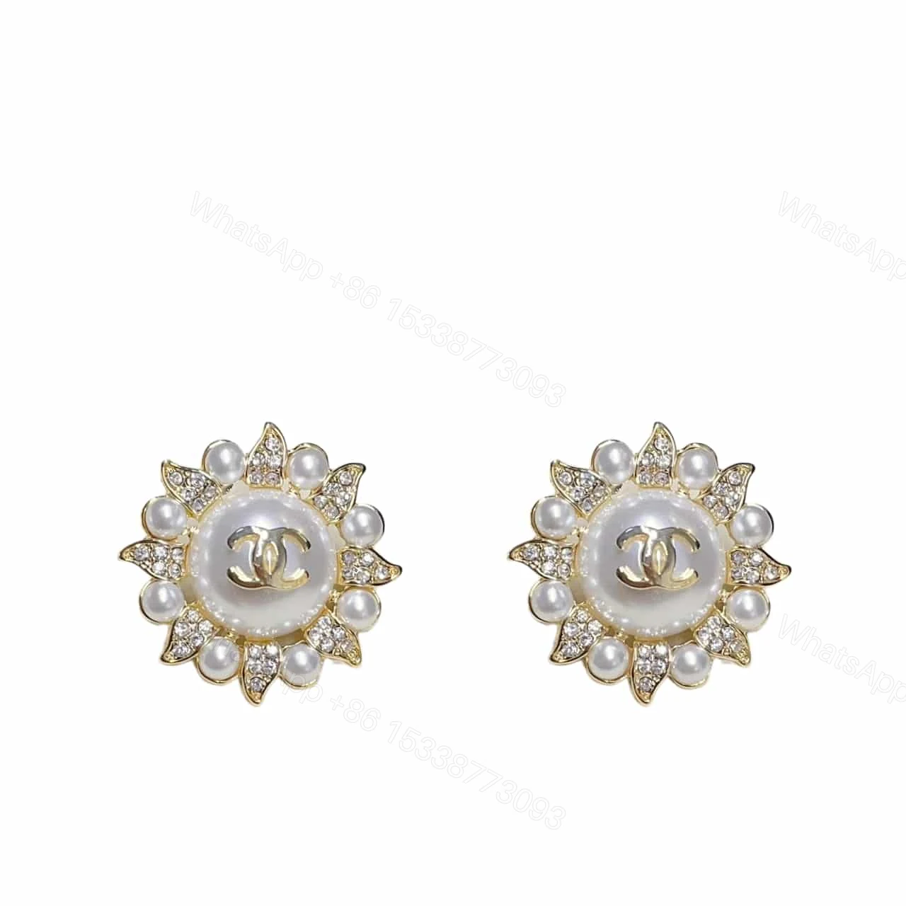 CHANEL SUNBURST PEARL AND CRYSTAL EARRINGS IN GOLD TONE — view 1