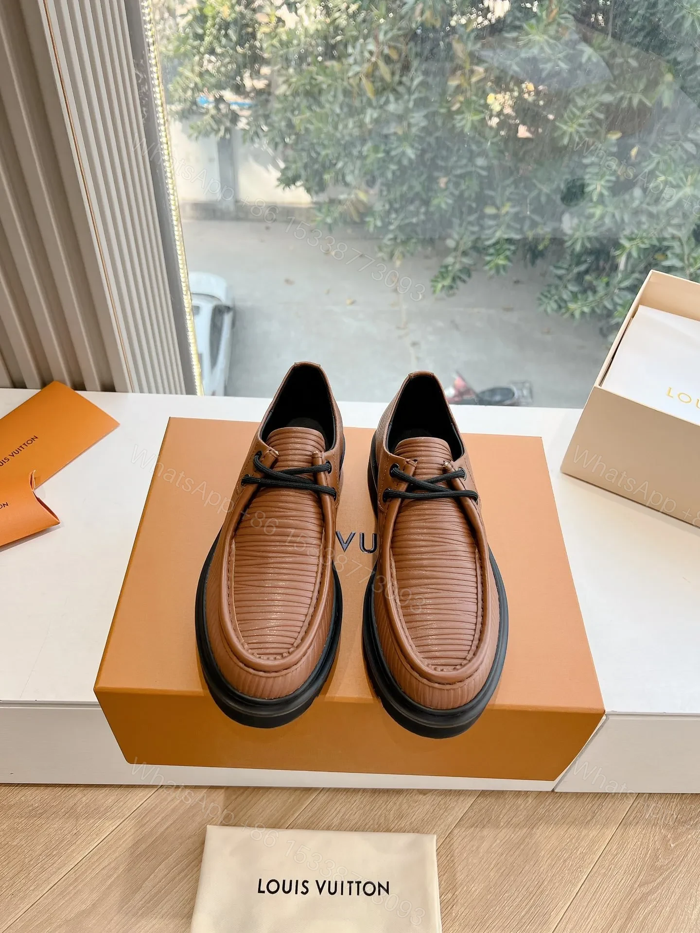 View 6 of LV Women Brown Textured Leather Loafers