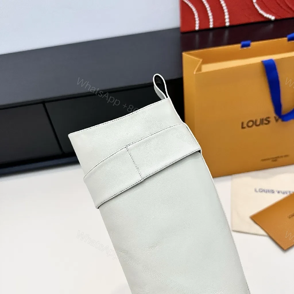 View 3 of Off-White Leather Boots: Minimalist Western Chic Comfort