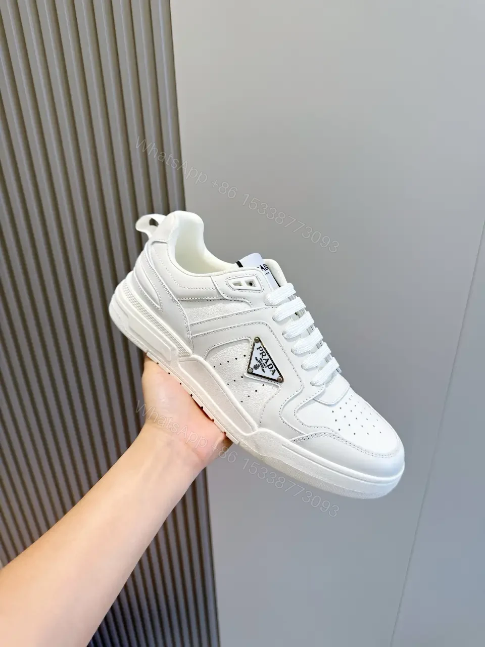 View 8 of White Leather Sneakers Minimalist Cushioning Prada Style Sneakers