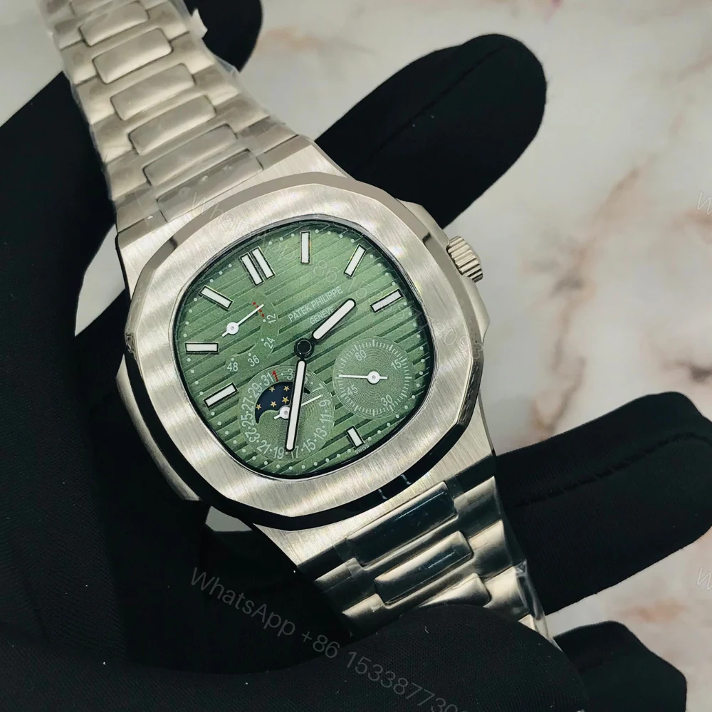 Patek Philippe Nautilus Green, Blue, Black Dial Watches — view 1