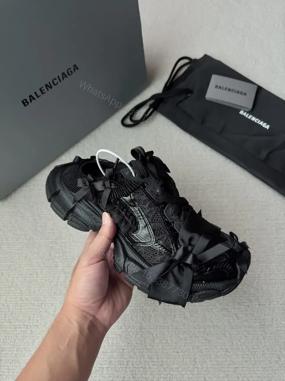 View 2 of Chunky Textured Luxury Sneakers with Satin Bow Accent
