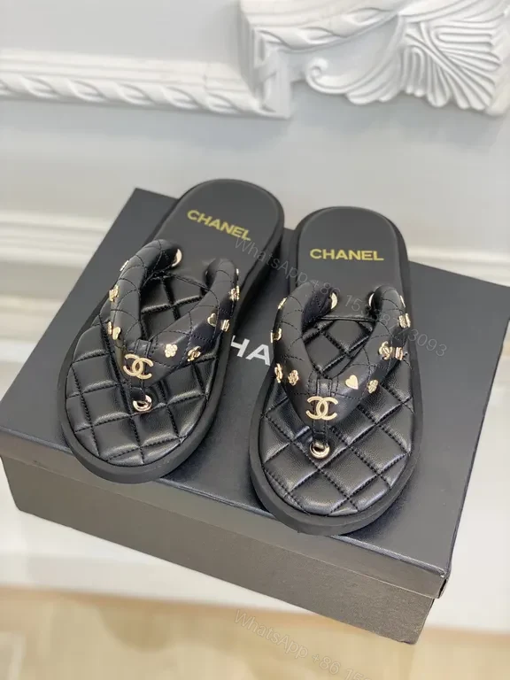 Quilted Leather Chanel-Style Slides with Gold Logo Accents — view 1