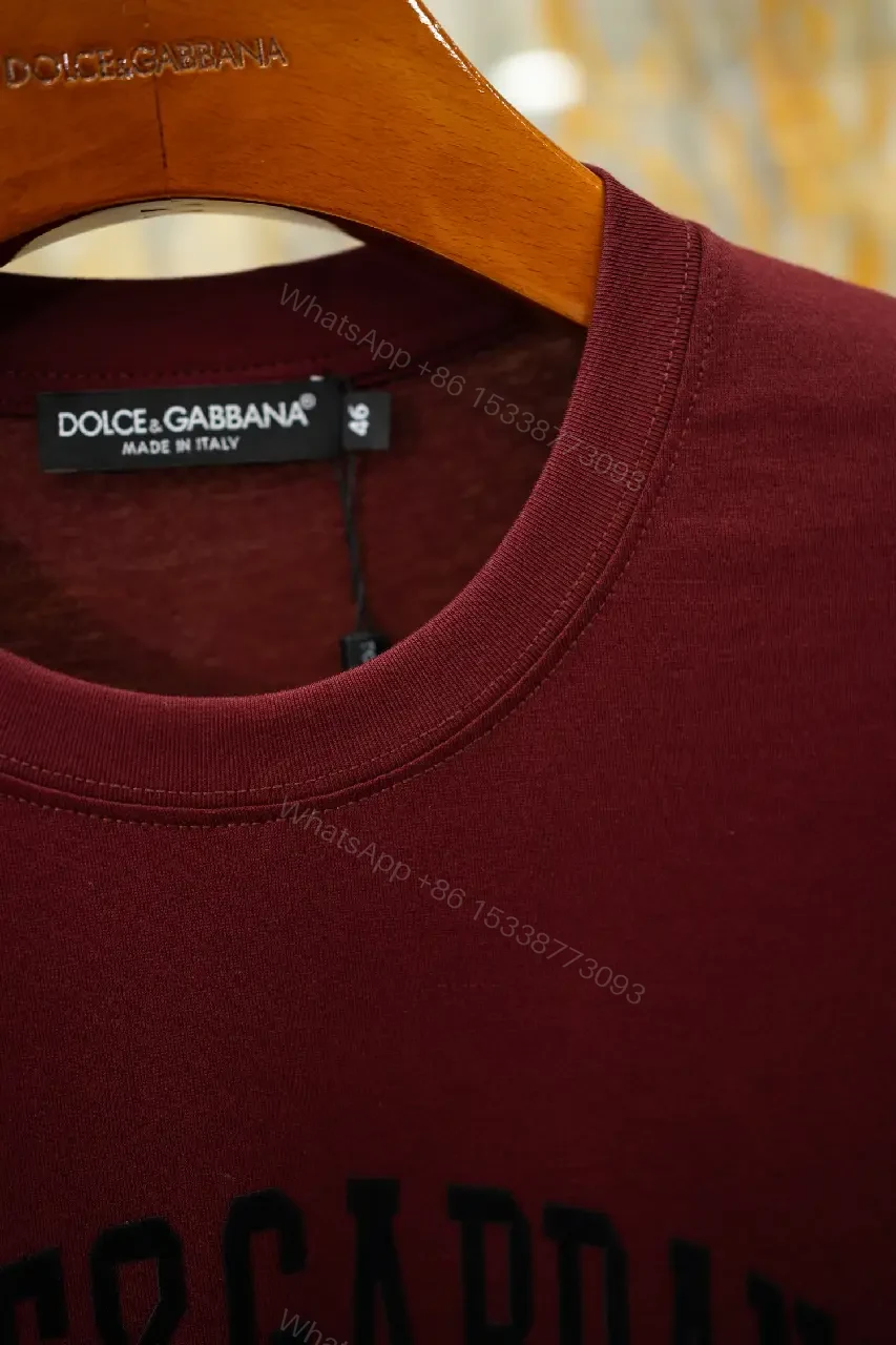 View 8 of Burgundy Short-Sleeve Crewneck T-Shirt with Black Logo Emblem