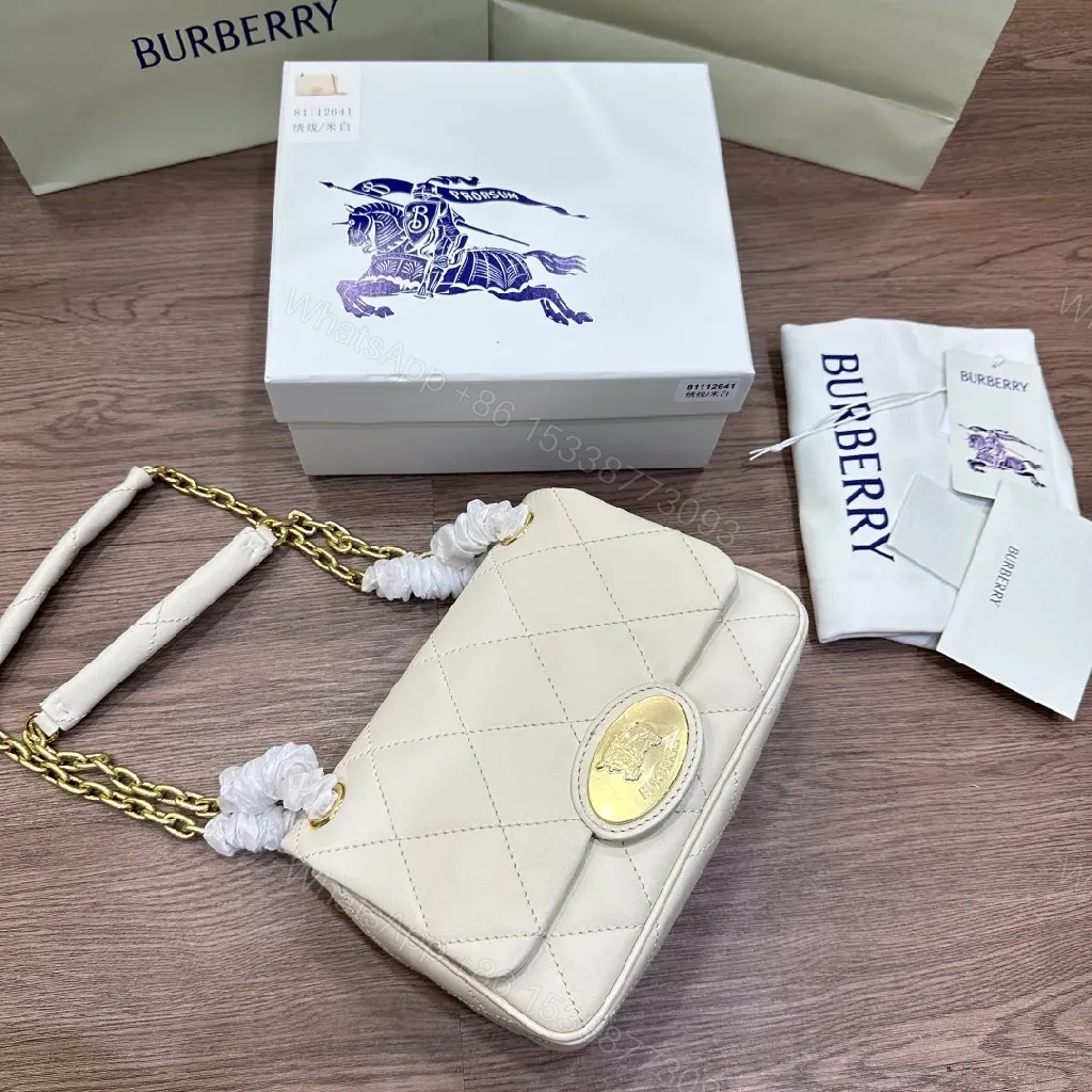 View 4 of Quilted Mini Crossbody: Diamond Stitch, Gold Hardware, Elegant Texture