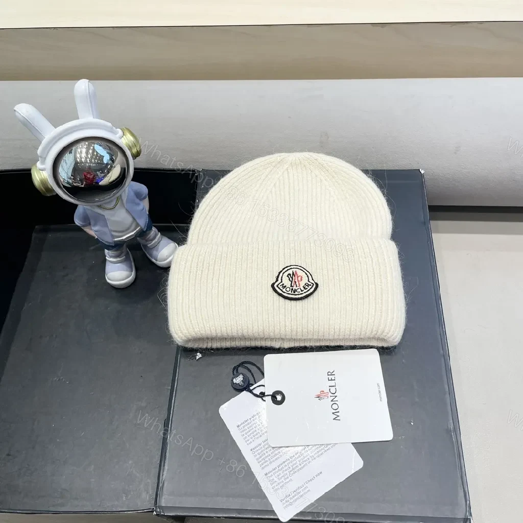 Cozy Crest Beanie in Ivory Knit with Subtle Logo Patch — view 1