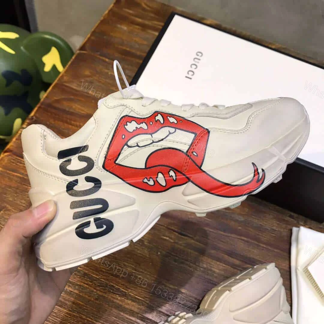 View 2 of GUCCI RHYTON SNEAKER WITH MOUTH PRINT