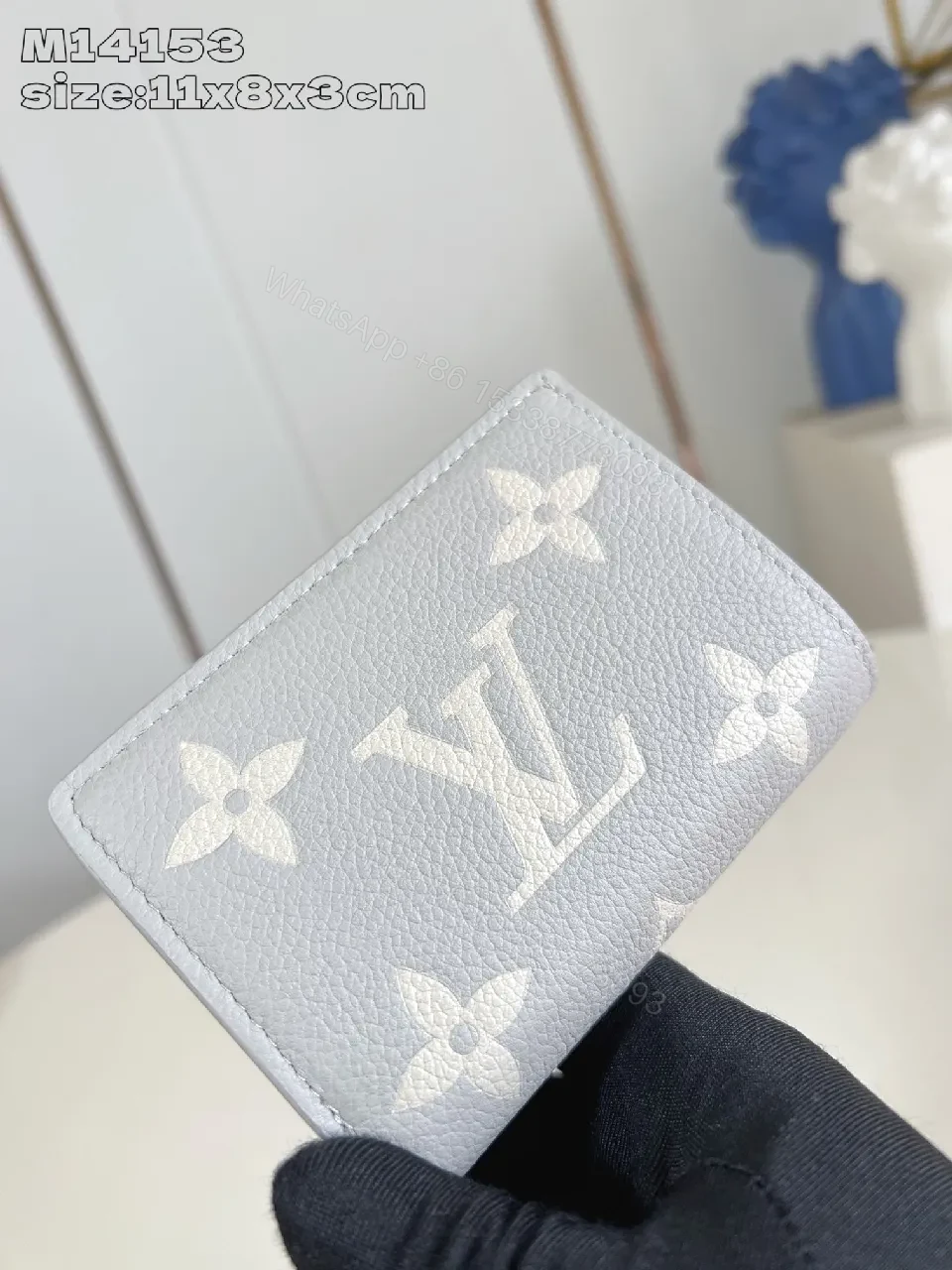 View 3 of Textured Leather Compact Wallet: Monogram Accent, Secure Zip, Minimal Luxury
