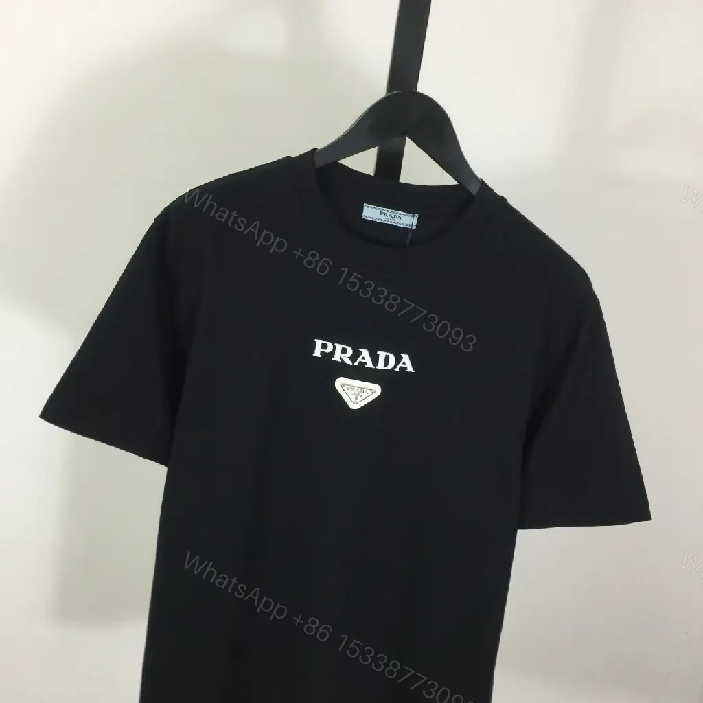 View 3 of Minimalist Black Logo Tee: Premium Cotton Blend, Relaxed Fit