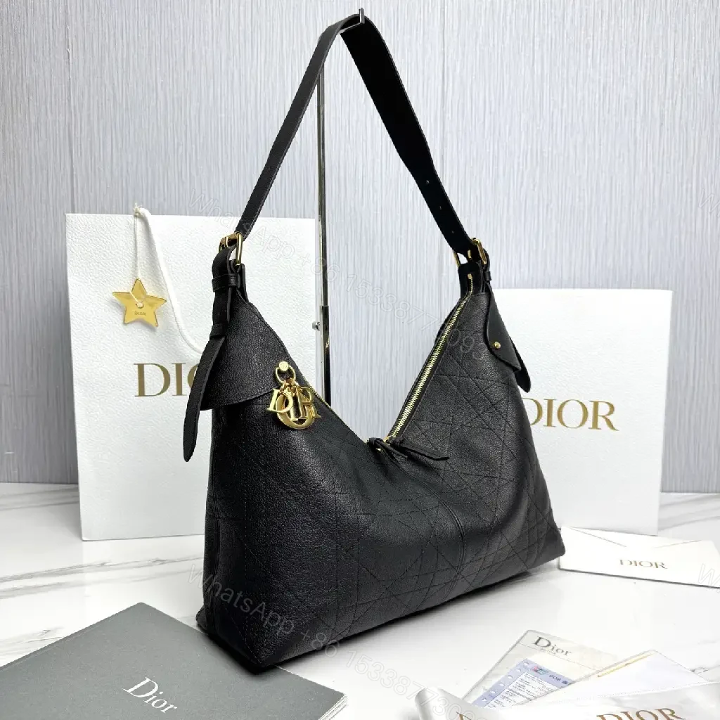 View 7 of Chic Black Leather Hobo with Gold Accents — Luxury Everyday Bag