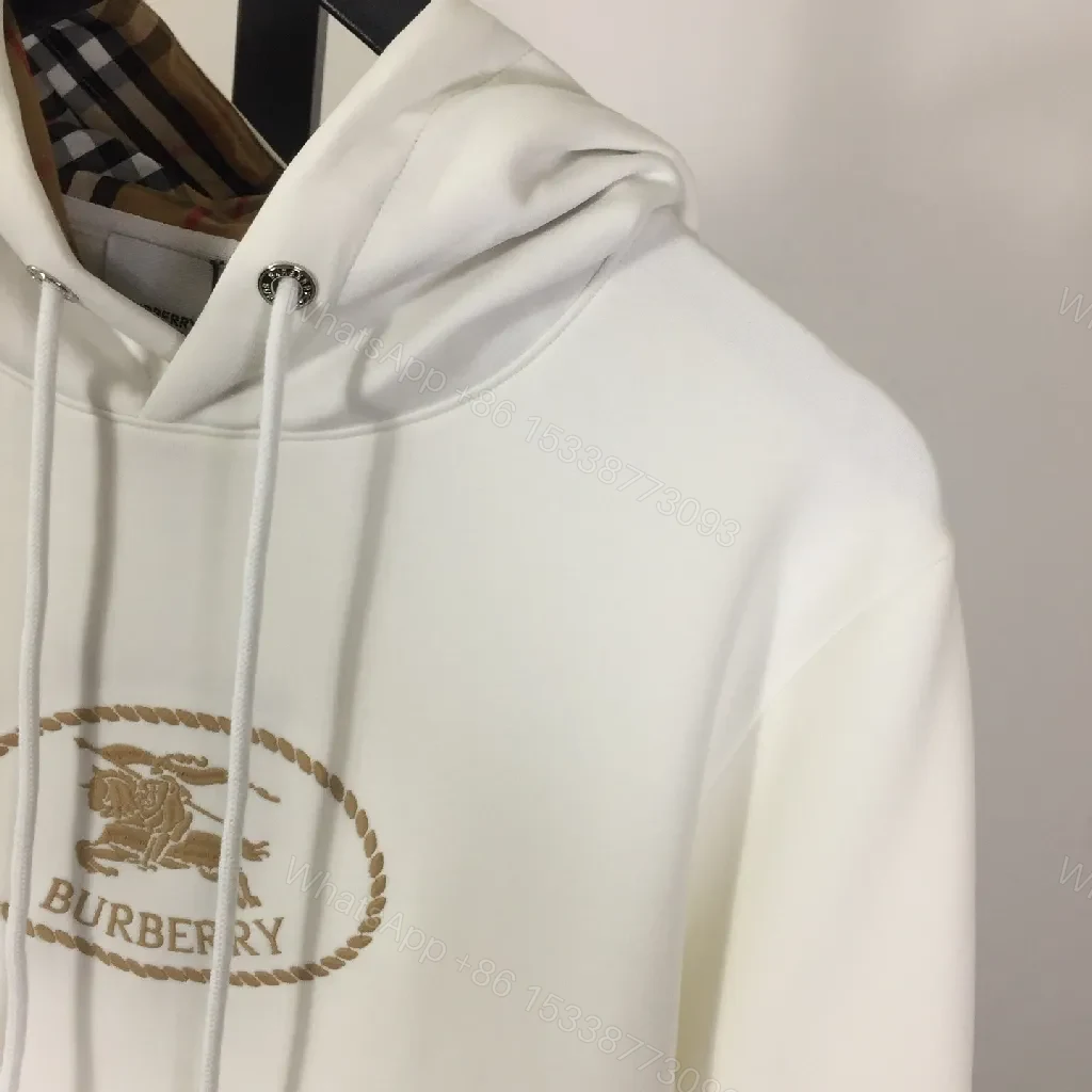 View 4 of Neutral Off-White Luxury Hoodie with Crest Embroidery