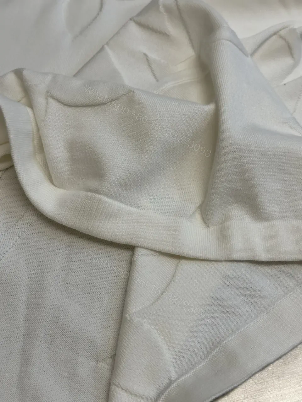 View 10 of Off-White Cream Oversized Tee with Embossed Logo Pattern