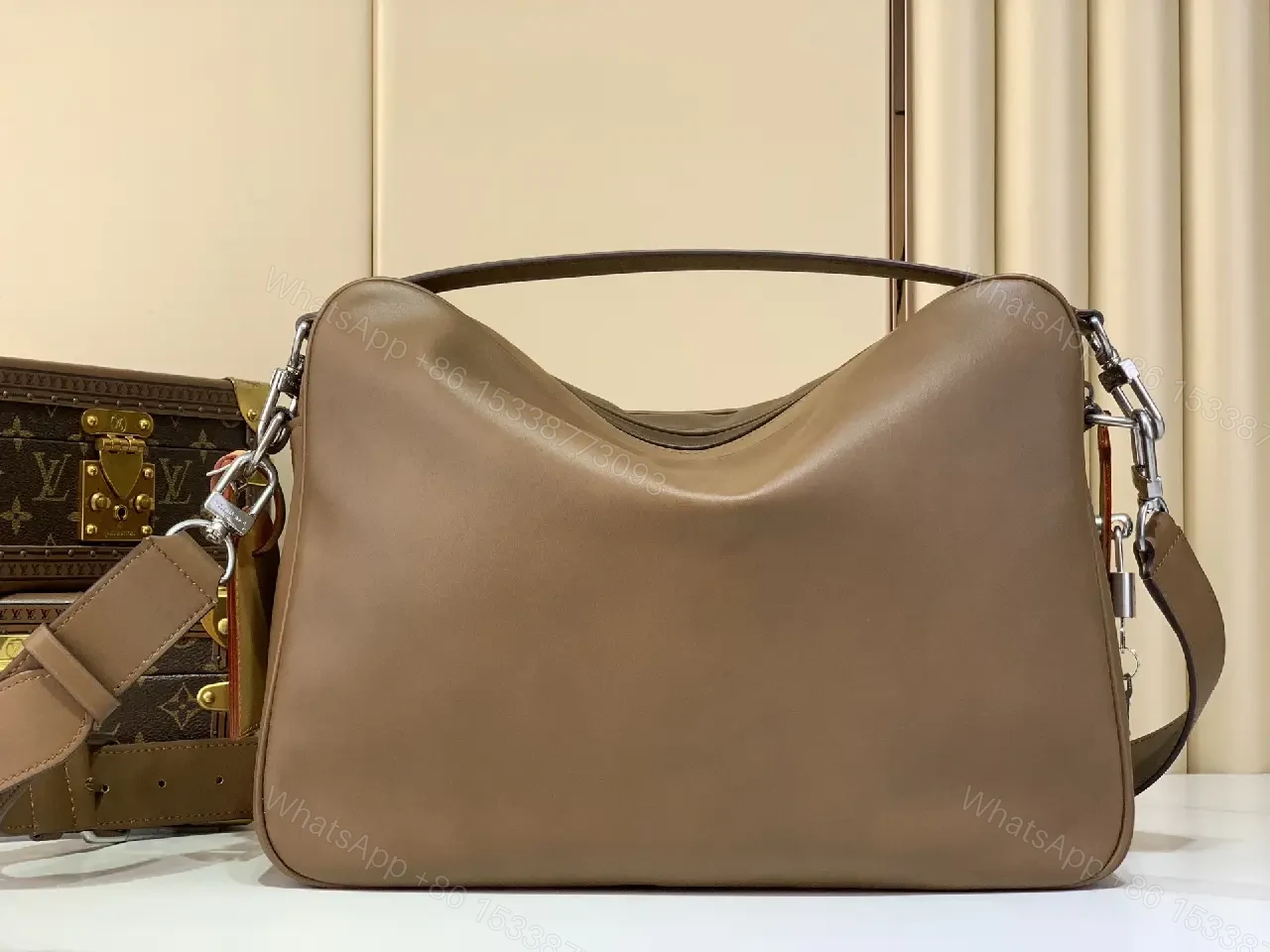 View 4 of Brown Leather Minimalist Messenger Bag with Subtle Stitching Details