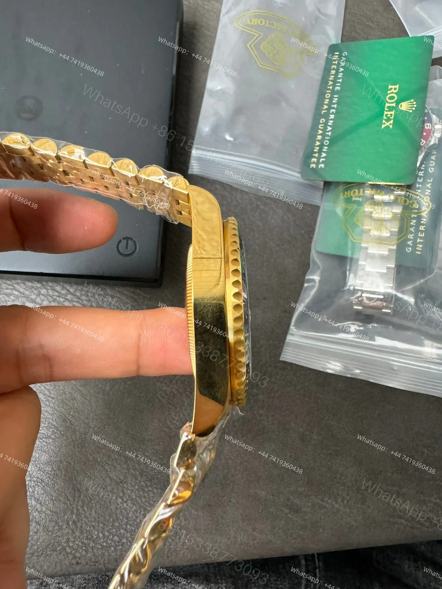 View 8 of Rolex Super Clone Watches 1:1 Gold GMT-Master II 126718GRNR Weighted Edition