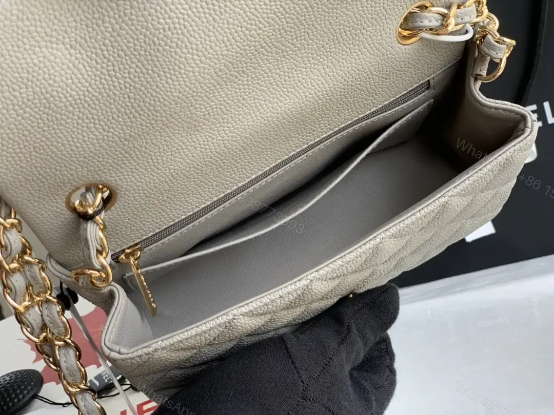 View 2 of Quilted Leather Crossbody: Compact Luxury with Gold Hardware