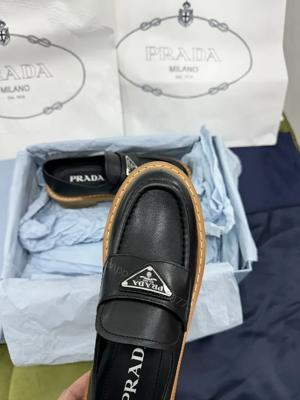 View 4 of Black Leather Loafers: Luxe Signature Crest, Rugged Comfort