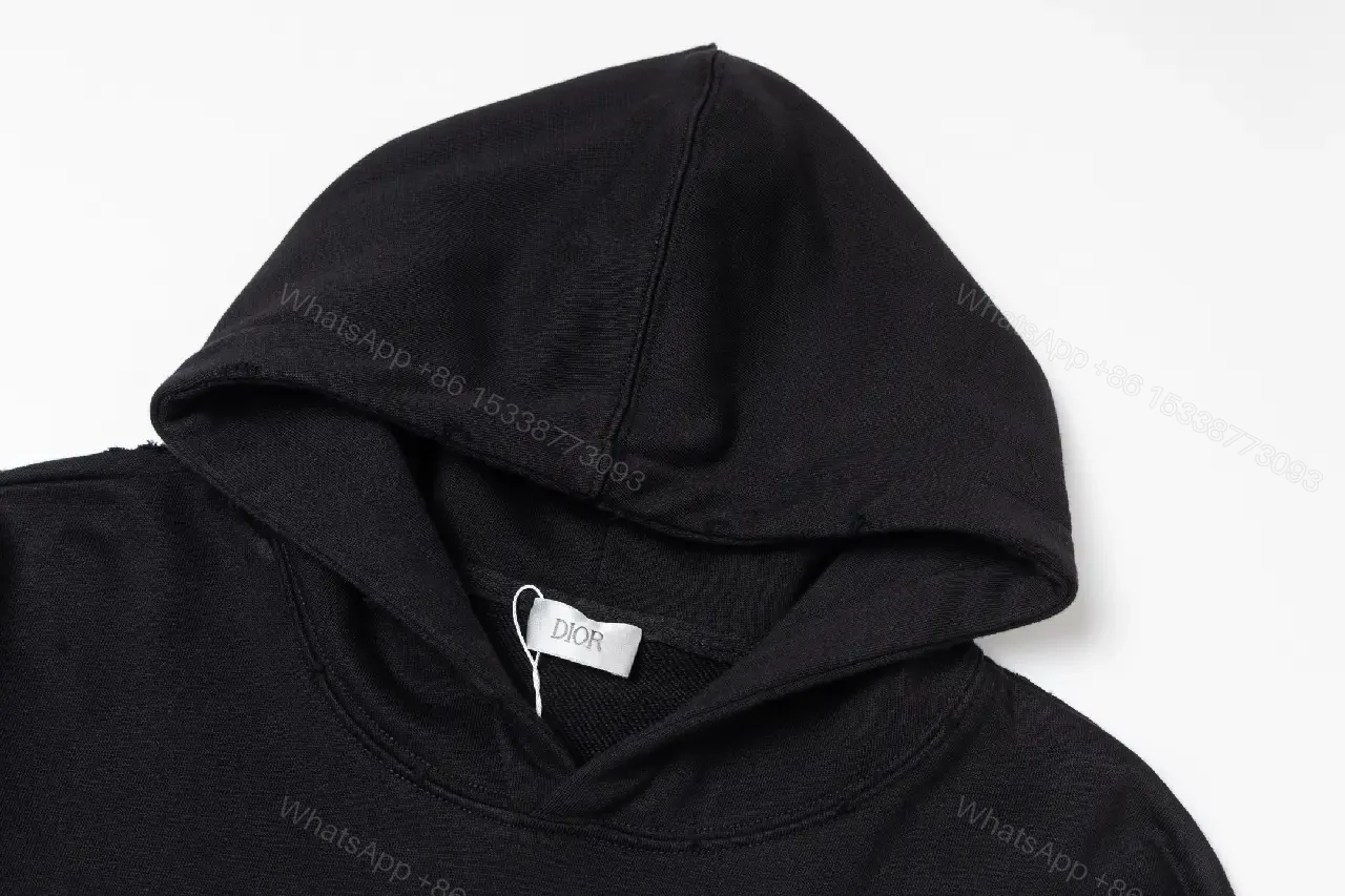 View 4 of Minimalist Black Hoodie – Subtle Dior Detail Luxury Streetwear