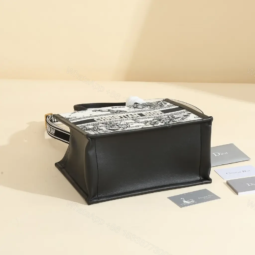 View 3 of Bold Black-White Tote: Structured, Crossbody-Ready Design