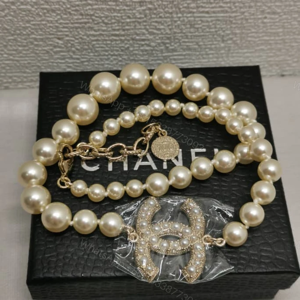 View 3 of Chanel Metallic Silver Tone Coco Faux Pearl CC Necklace