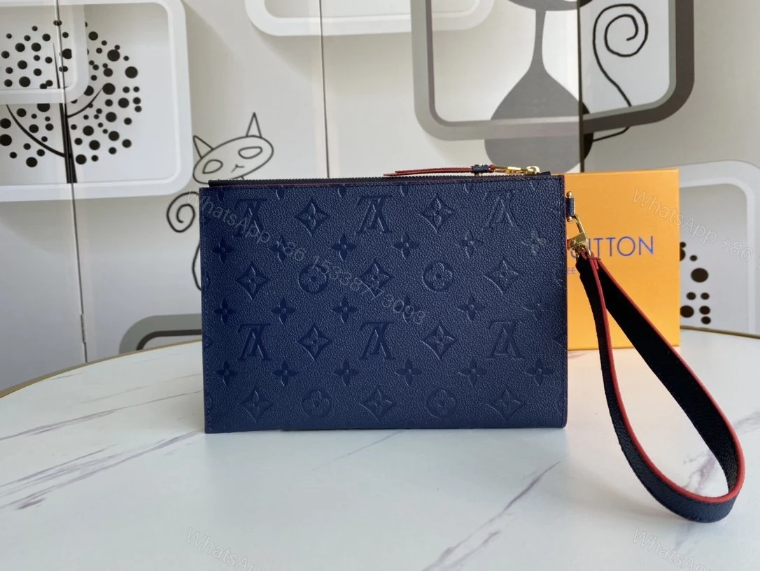 View 7 of Louis Vuitton Marine Rogue Monogram Empreinte Daily Pouch
